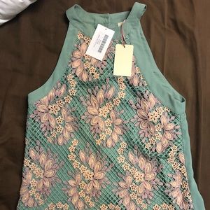 NWT Entro sleeveless high neck blouse